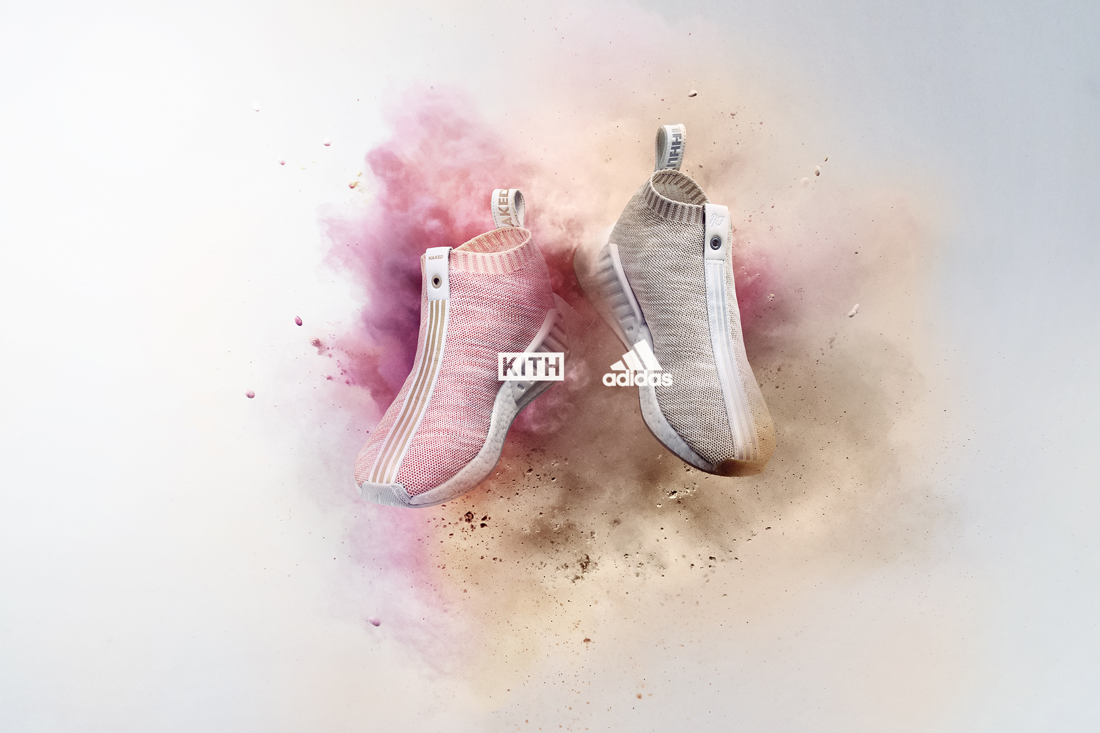 An advert for Adidas shoes on a powdery pink and white background.