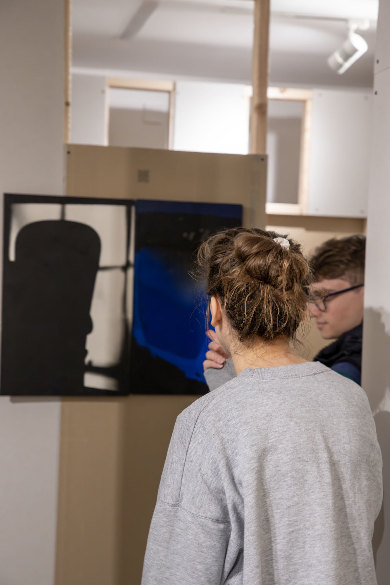 People observing artwork by Ian McKeever in TheGallery at AUB.