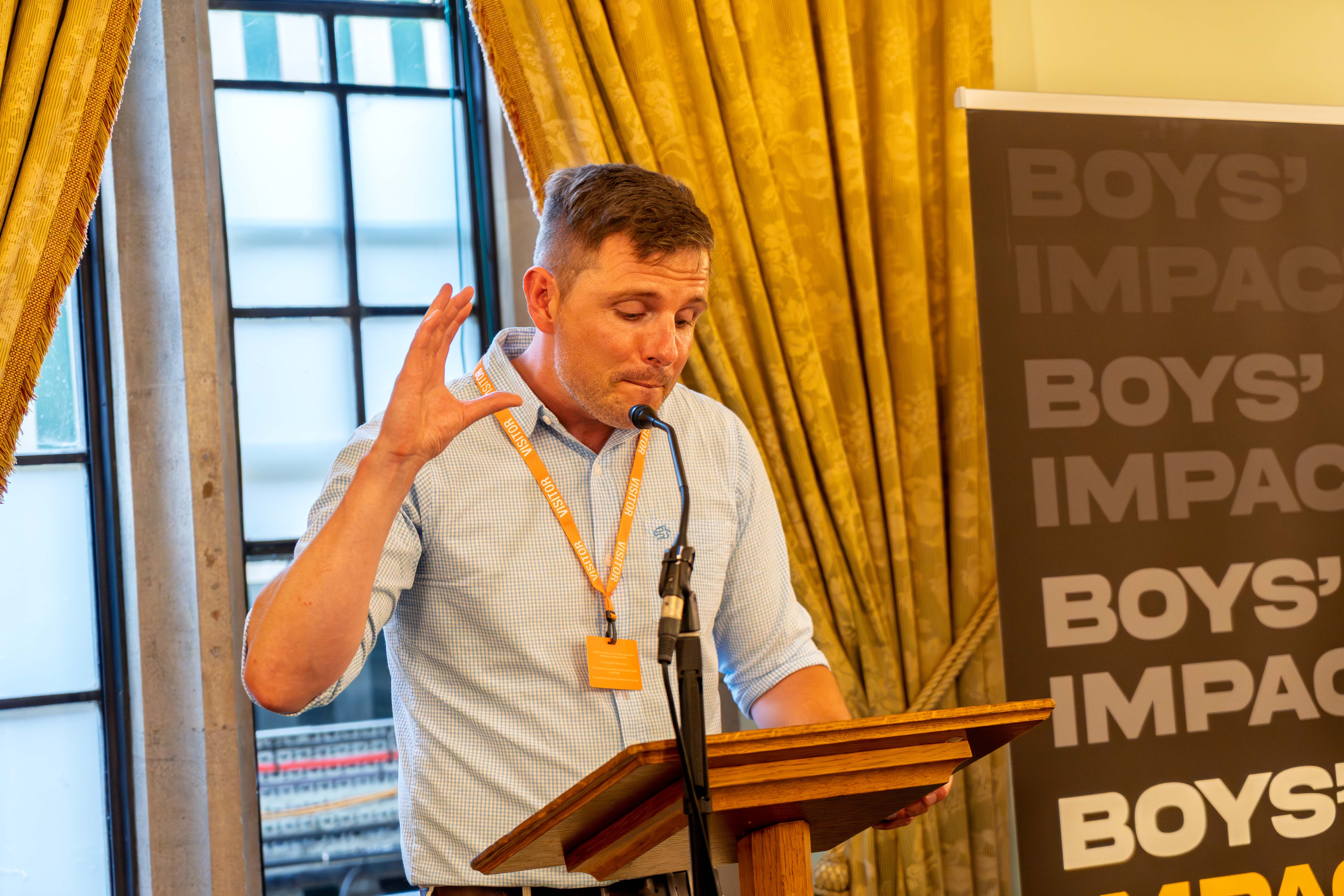 Dr A. Blower speaking at a Boys' Impact report launch at Parliament.