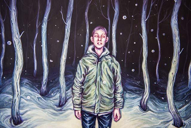 Illustration of a boy standing in a snowy forest at night, with dead trees surrounding him.