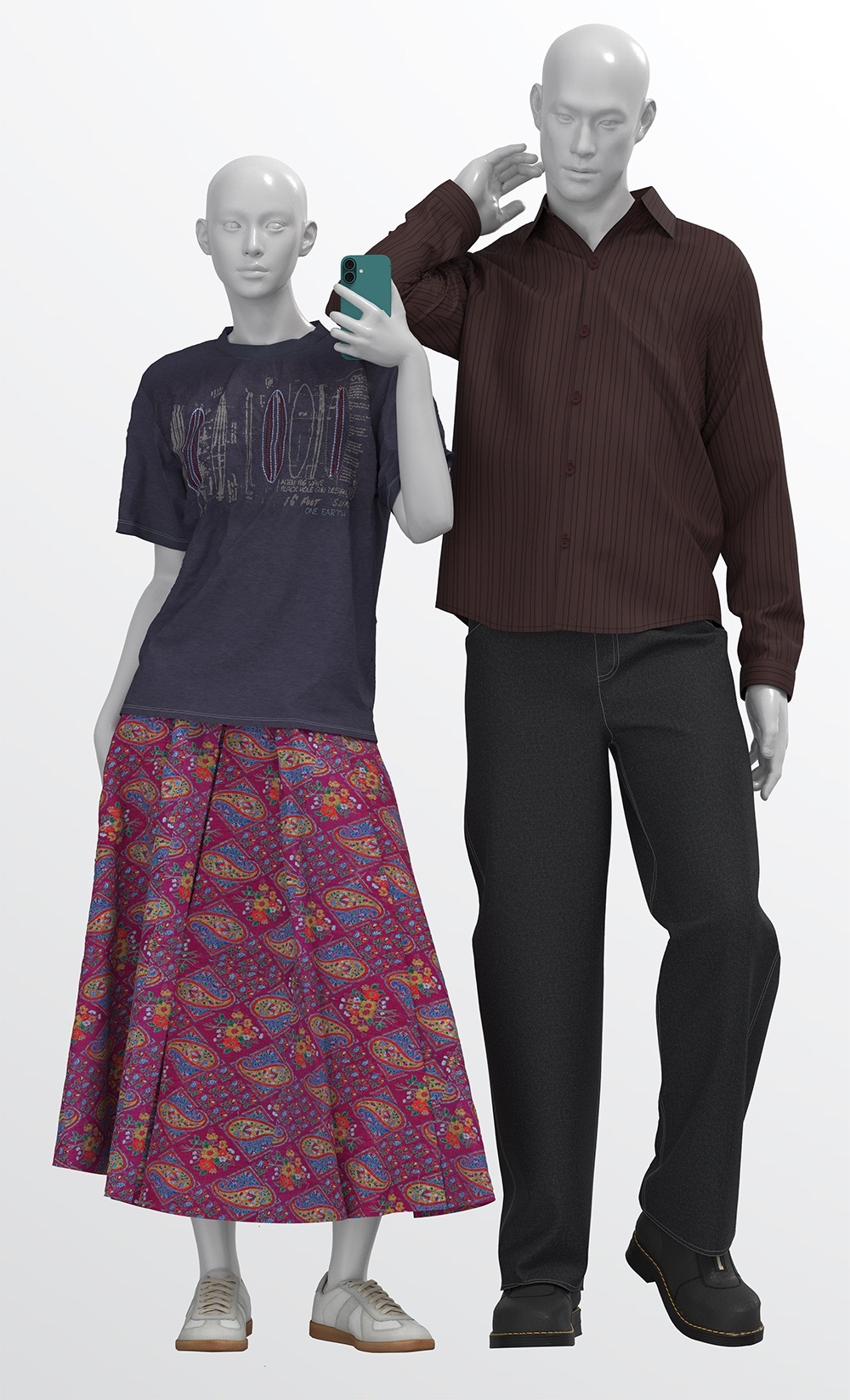 Two mannequins against white background. Left: shorter figure in black t-shirt and patterned burgundy skirt. Right: taller figure in brown jumper and dark trousers.