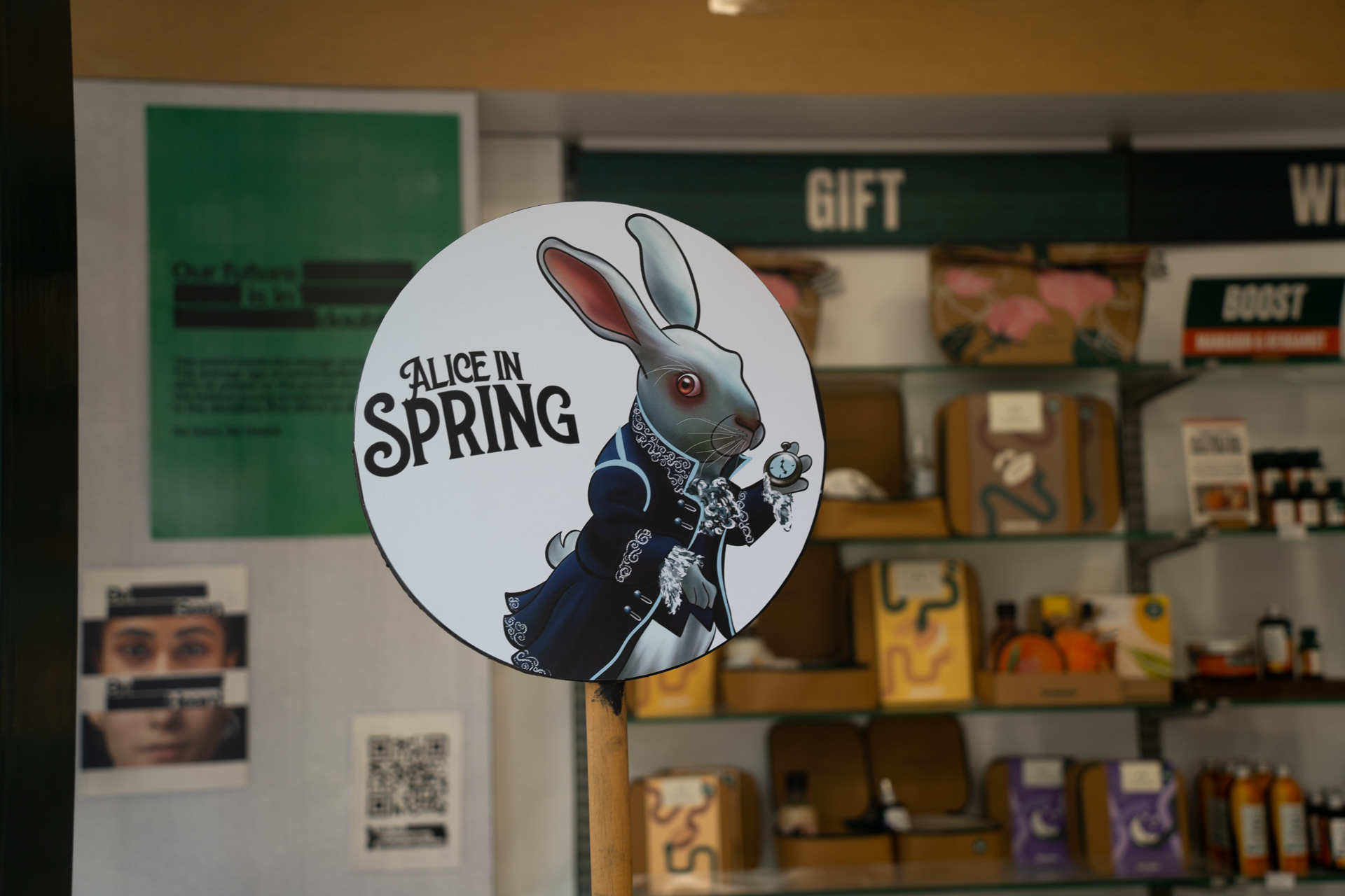 An event logo imposed on a gift shop background