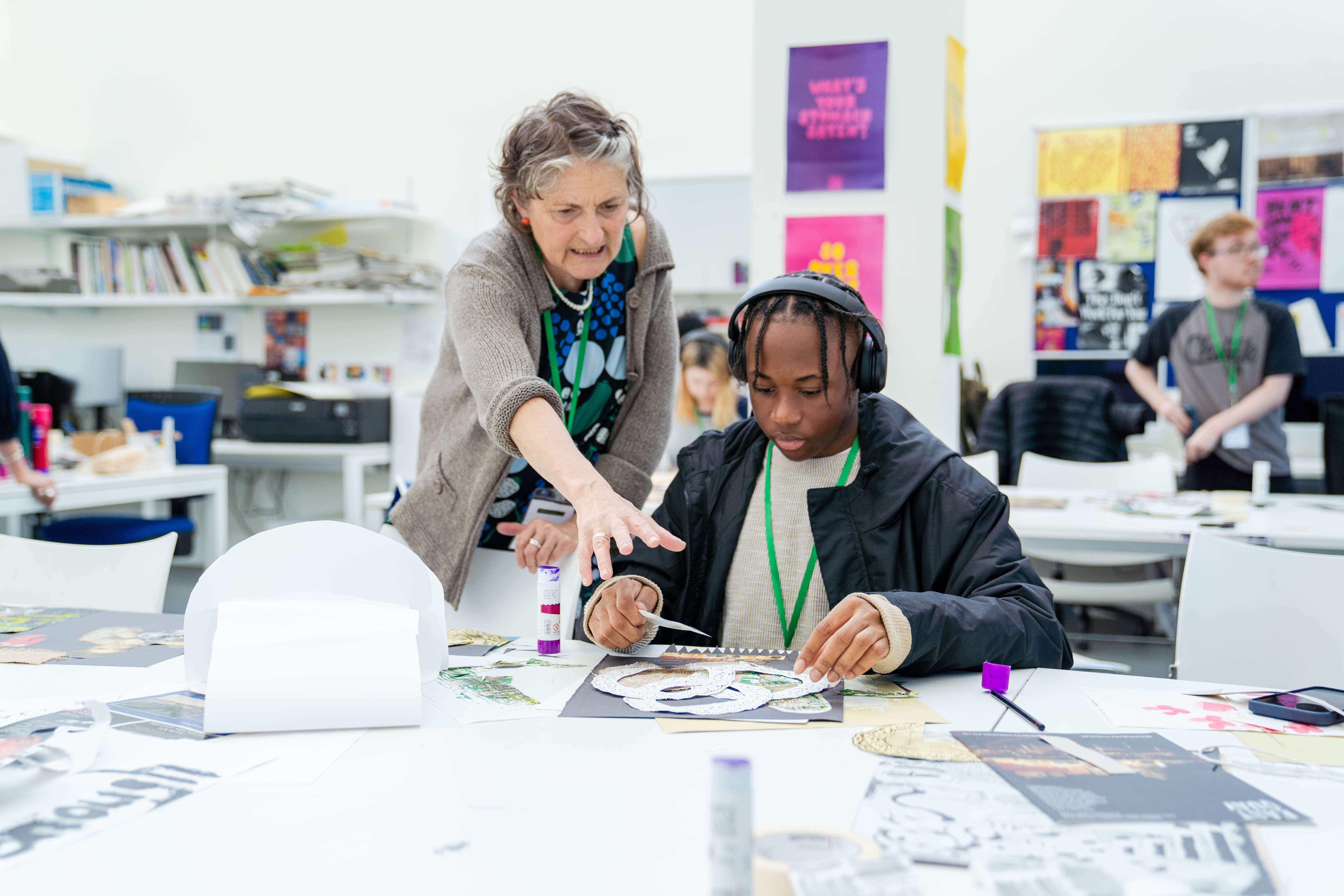 A teacher is instructing a student