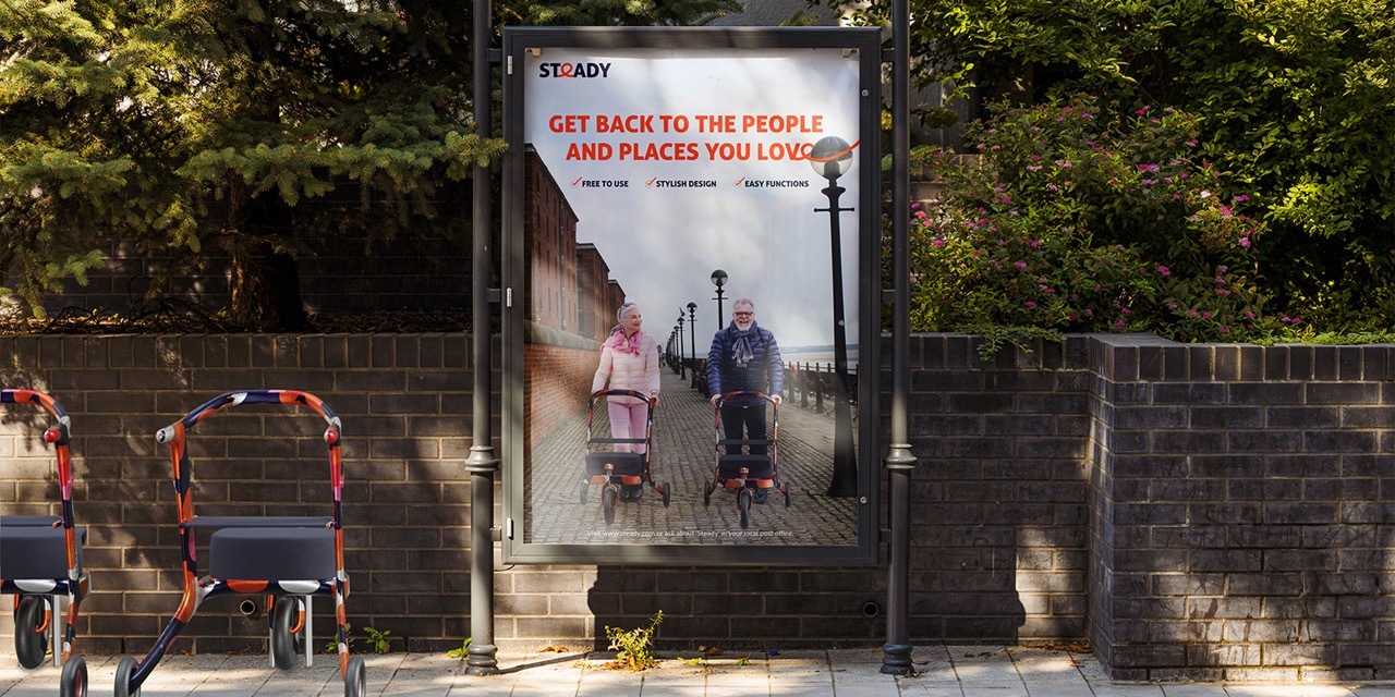 A billboard containing two older adults pushing colourful mobility aids with more mobility aids docked onto the pavement next to it.