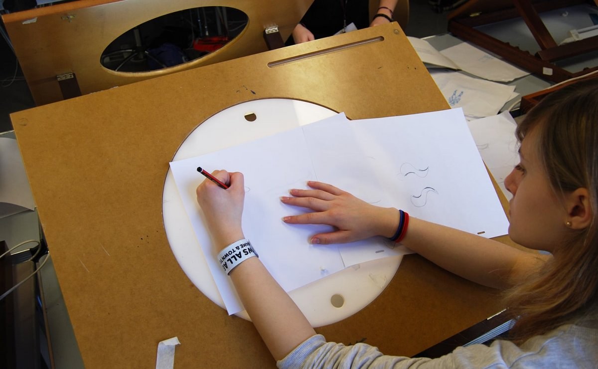 Student using a lightbox