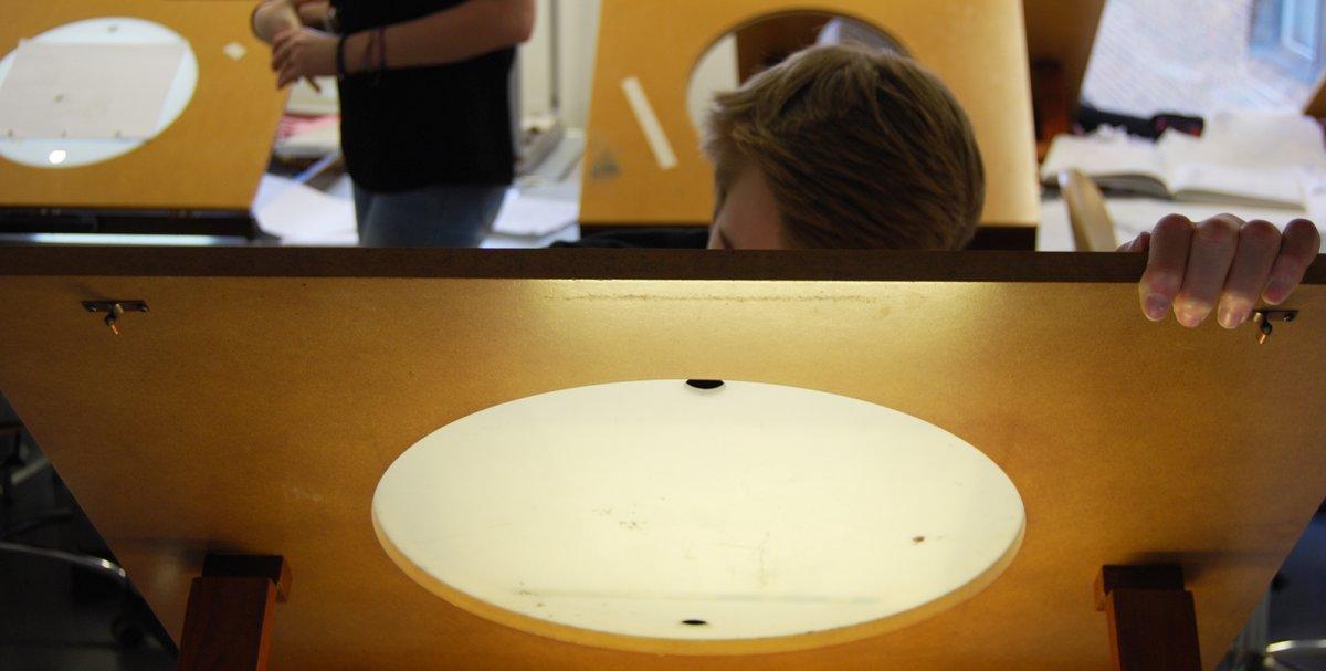 Student using a lightbox