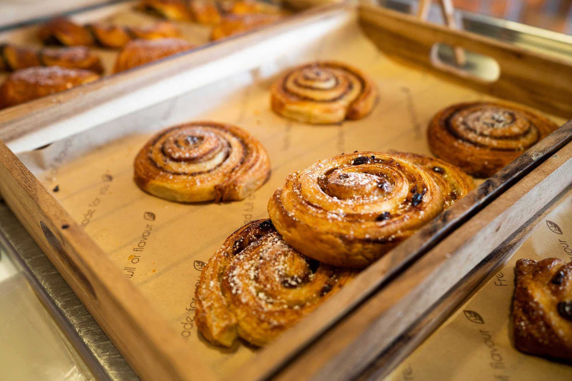 Arts Bar counter displaying cinnamon swirls