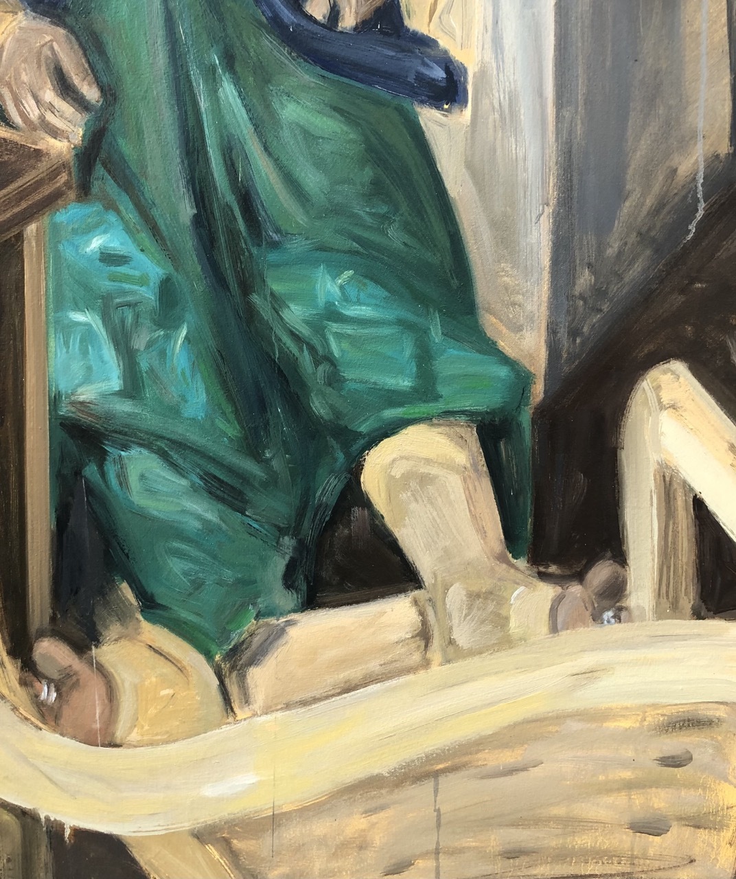 Oil painting showing figure in emerald green dress with navy blue sleeves, seated on pale wooden surface with grey drapery background.