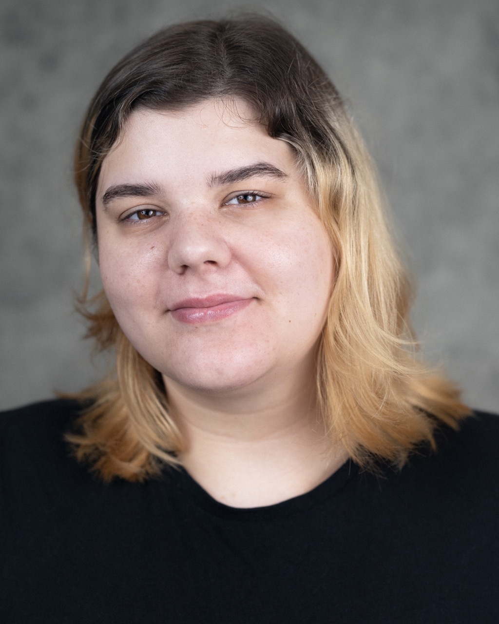 A headshot of Avery Kirin