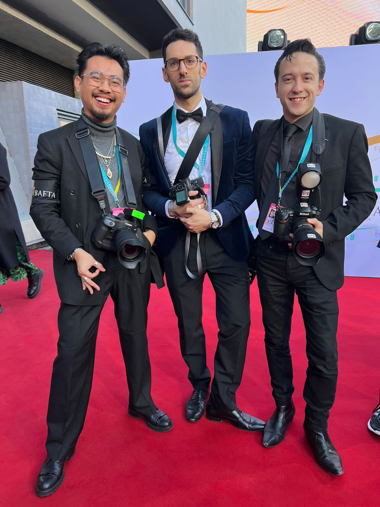 Gabriel Bush on the red carpet with other photographers and his camera.