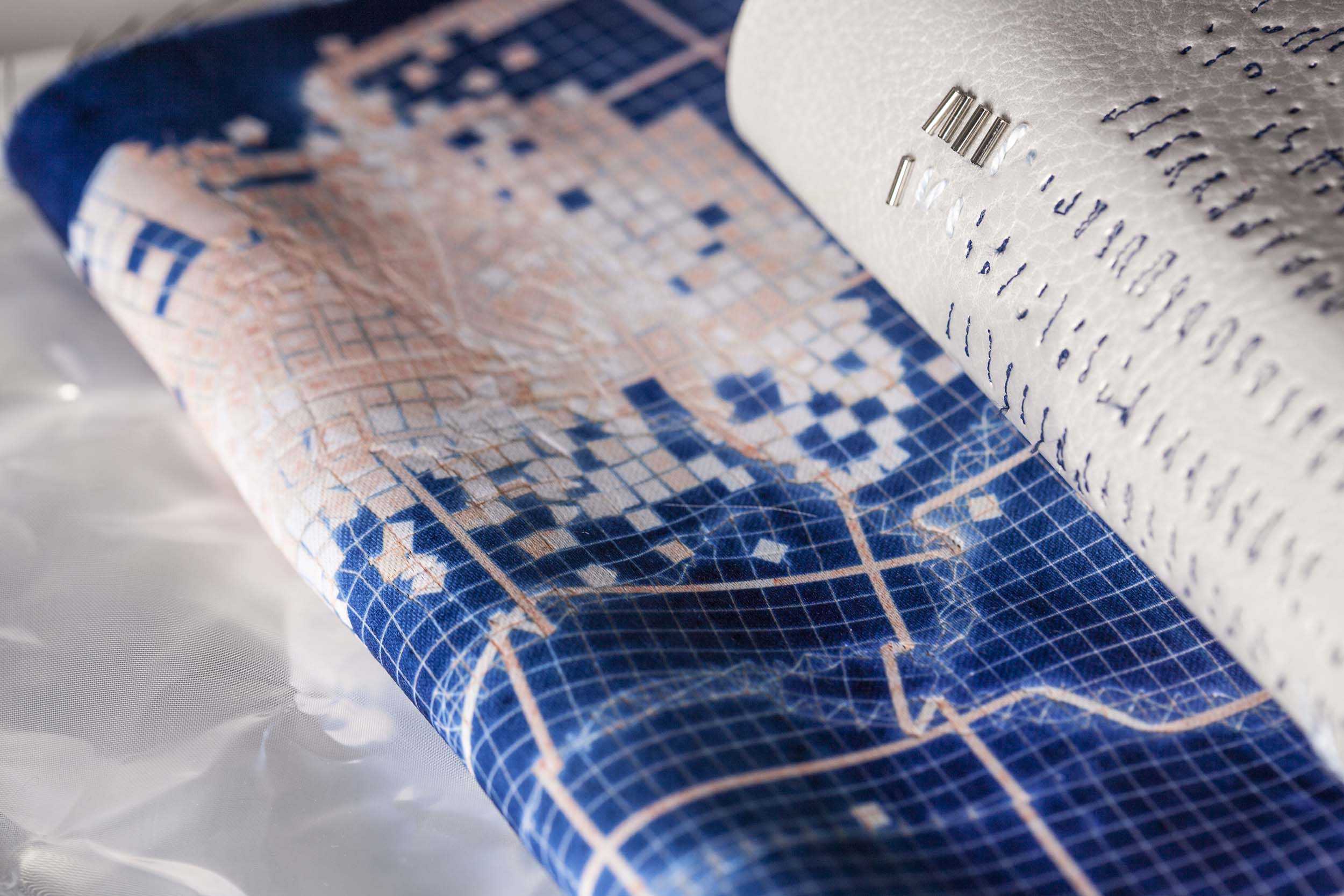 Two rolls of fabric, each with a different pattern.