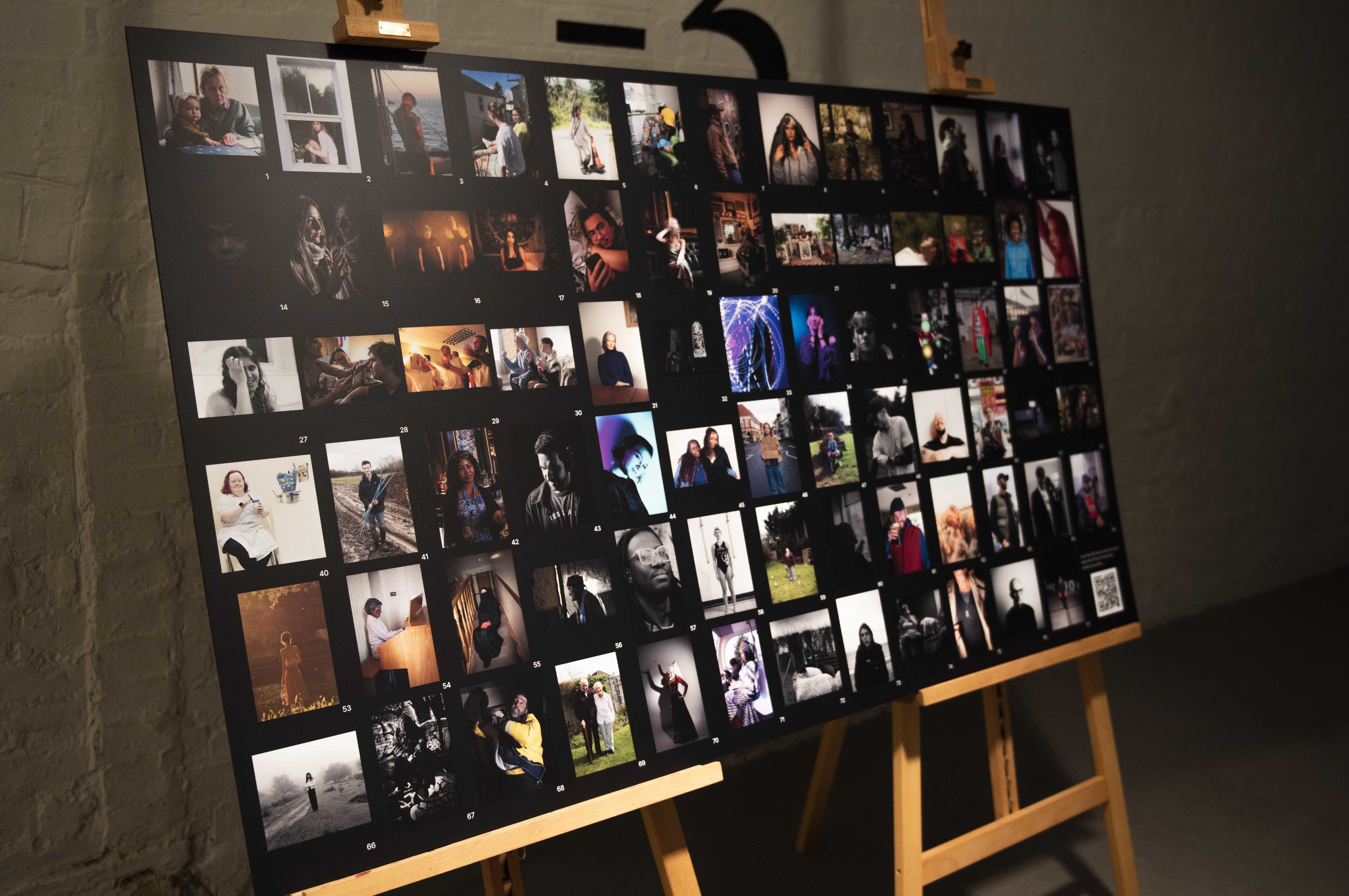 A canvas showing a large grid of portraits, as shown at Photo Portrait Now at the National Portrait Gallery.