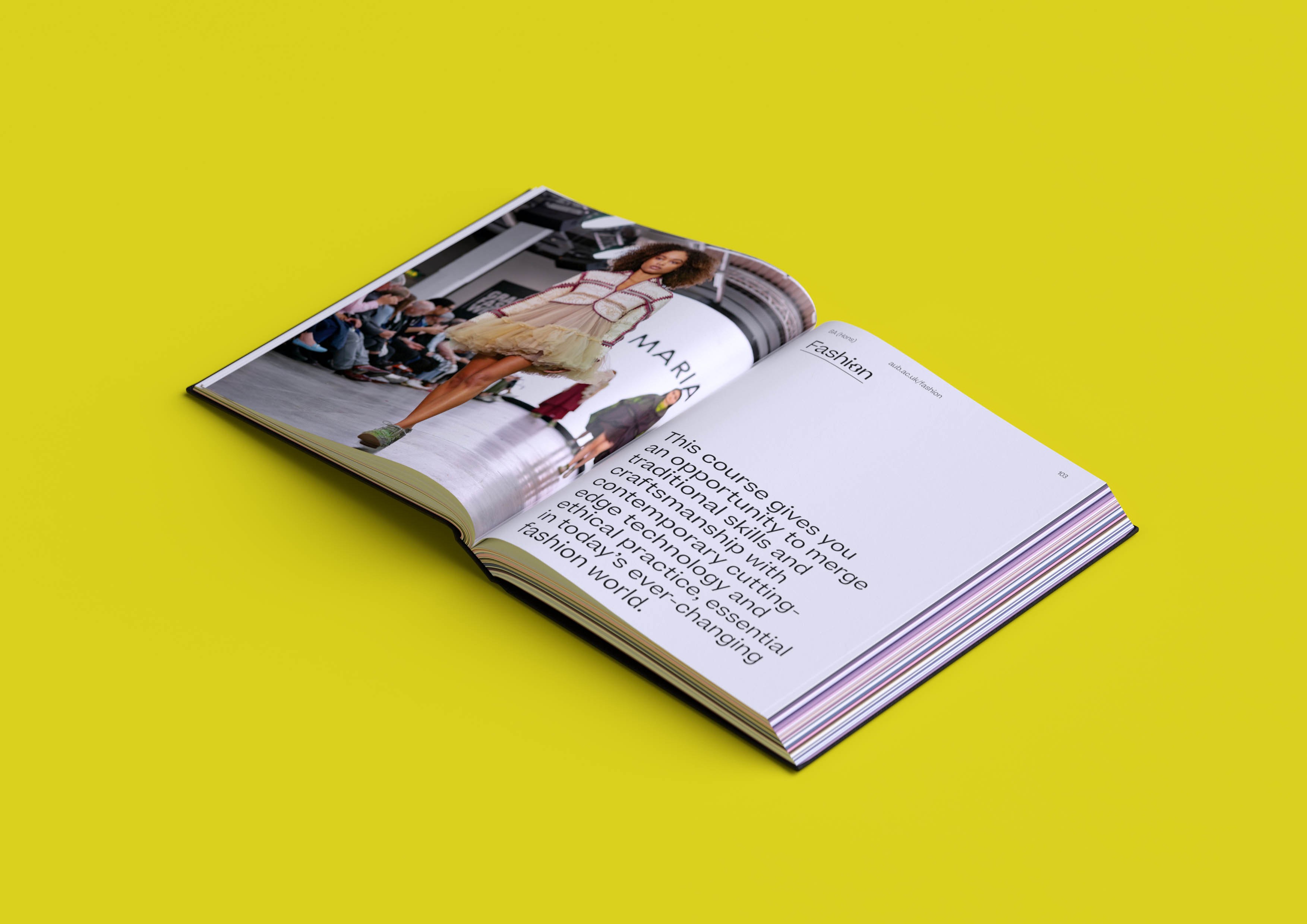 Double page spread of a hardback book on a bright yellow background. The left-hand page shows a model walking. The right-hand has a block of text and the title 'Fashion' at the top.