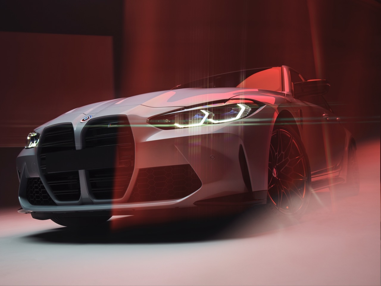 A BMW M3 with red lighting.