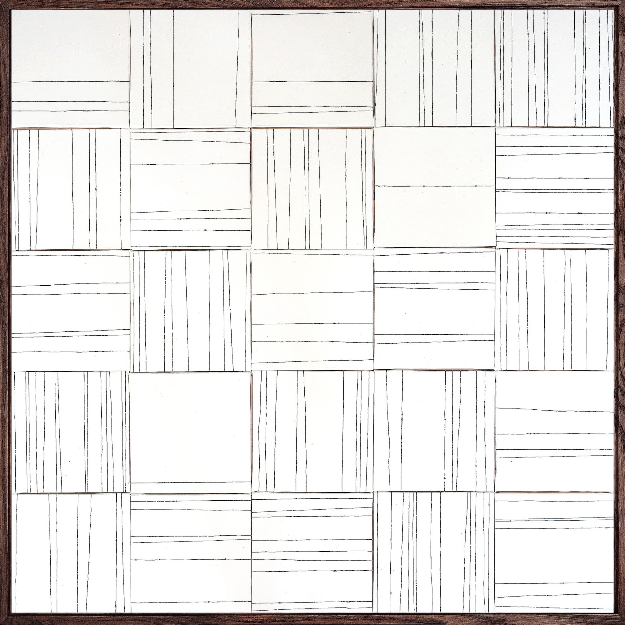 A series of square tiles with lines drawn vertically and horizontally at differing points.