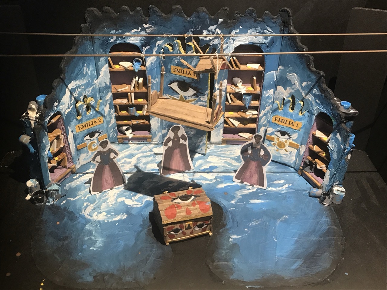 3D street art showing pirate ships with brown wooden structures and black-and-white striped sails on blue water background.