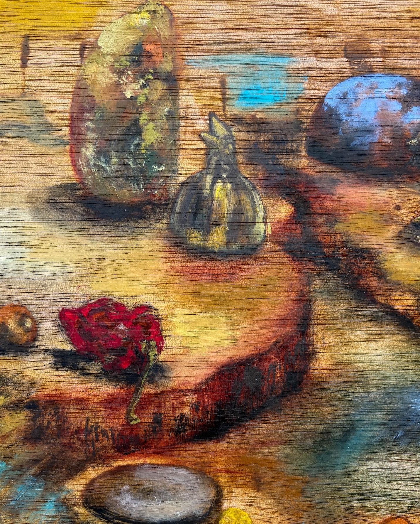Still life painting on wood surface with yellow and green vessels, blue bowl, grey stones, and red flowers in warm earth tones.