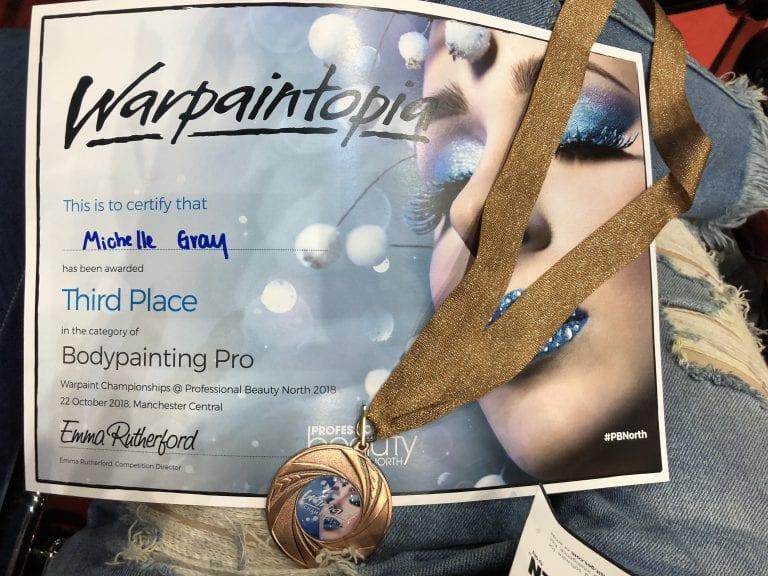 Michelle’s medal and certificate