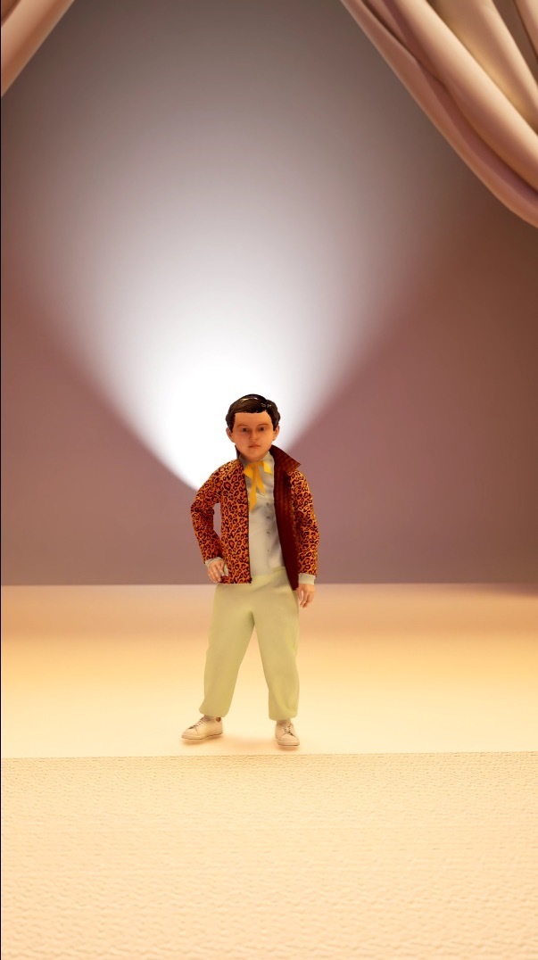 3D render of a child wearing a floral red fleece and light clothes on stage.