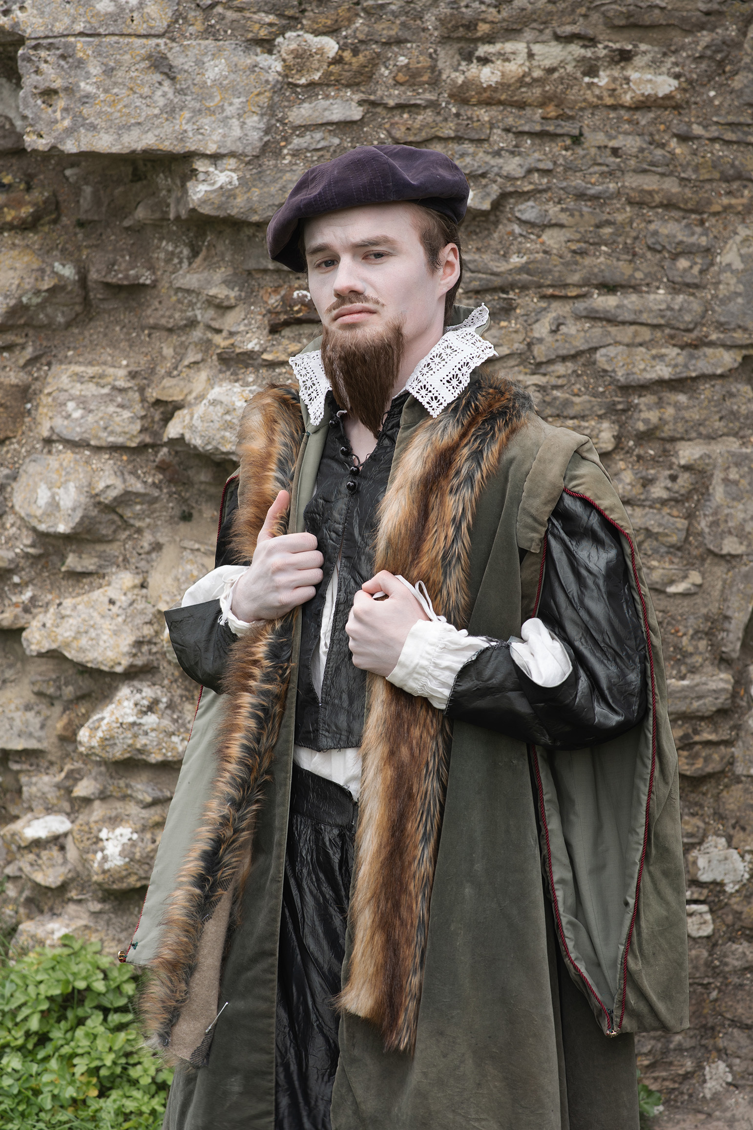 Actor playing Christopher Hutton, posing at Corfe Castle as part of a collaboration between AUB alumna and the National Trust
