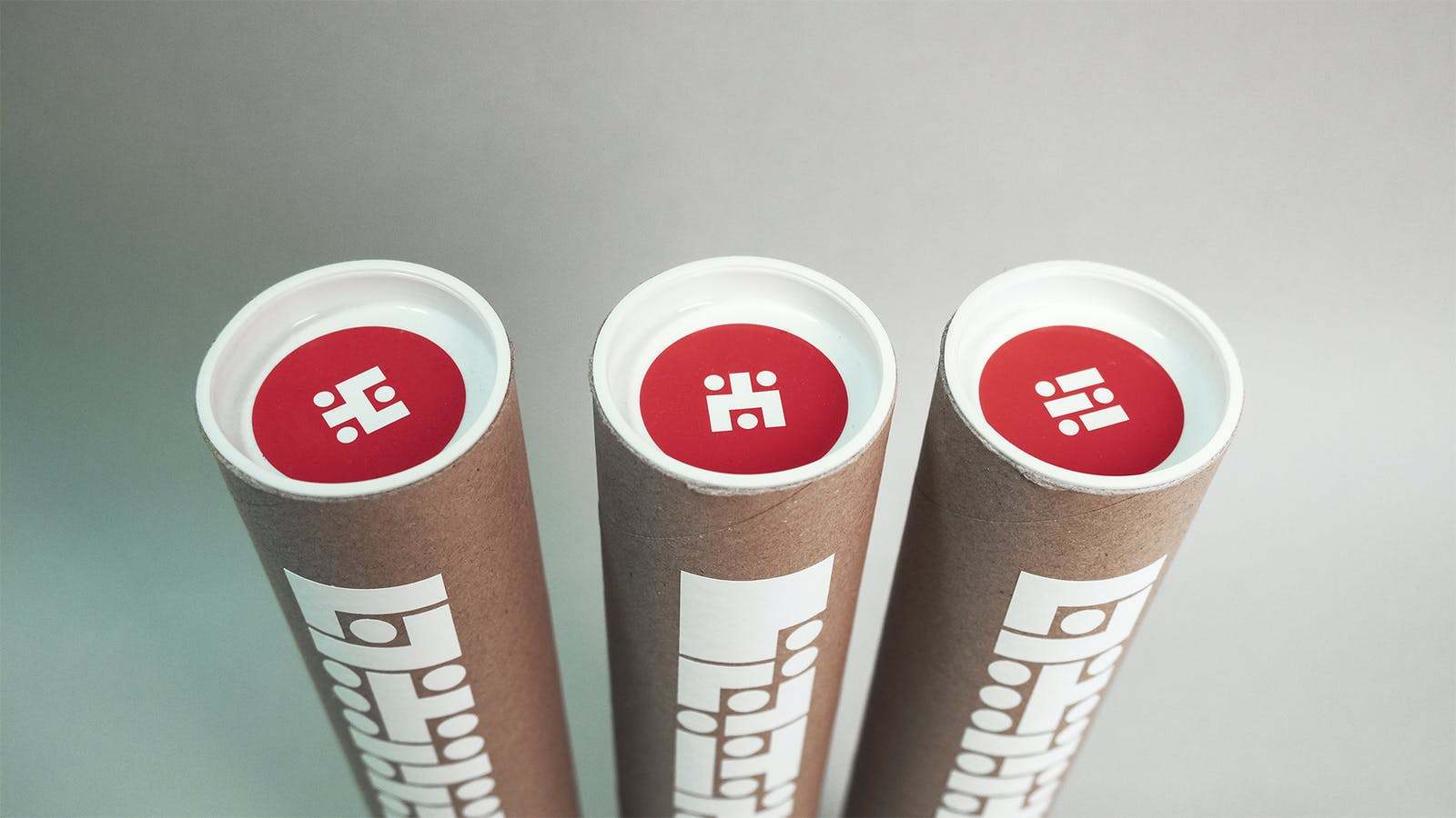 Square and Circular shape symbols printed in solid colour on poster packaging tubes