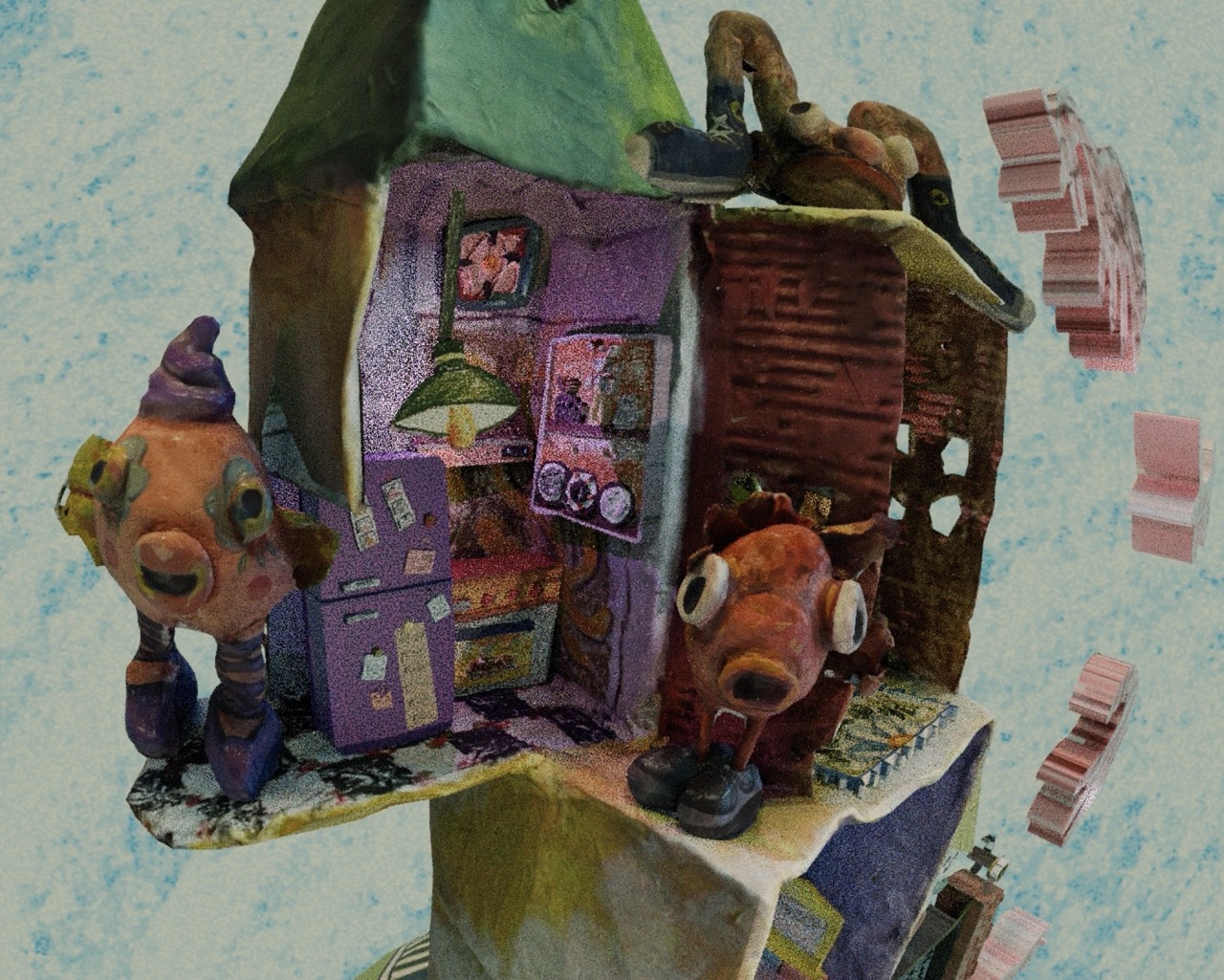 A colourful mixed-media house sculpture with open rooms, small figurines and furniture, set against a pale blue background.