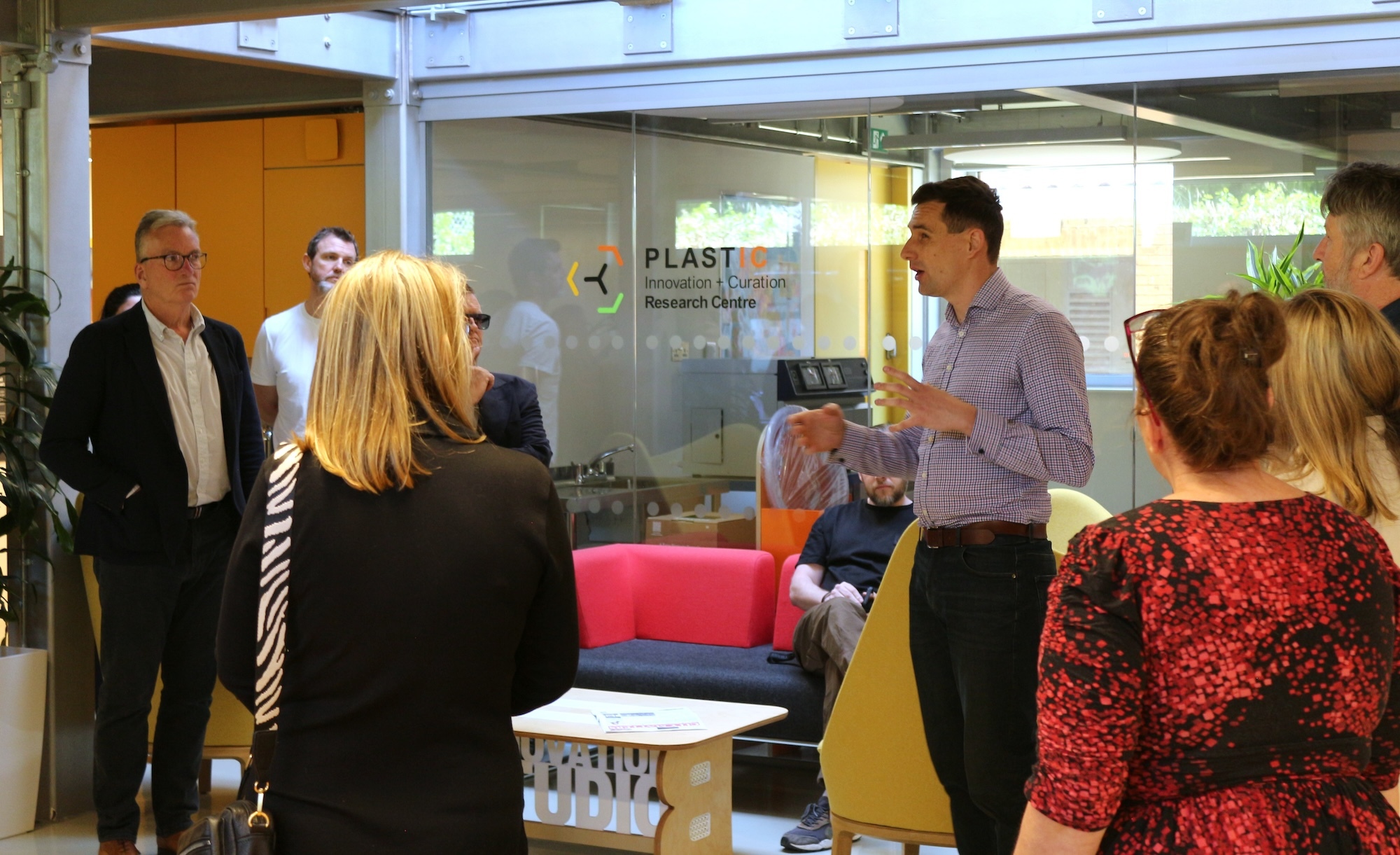 R Fanner speaking to attendees of the Co:Create innovation event while touring the Innovation Studio at Arts University Bournemouth.