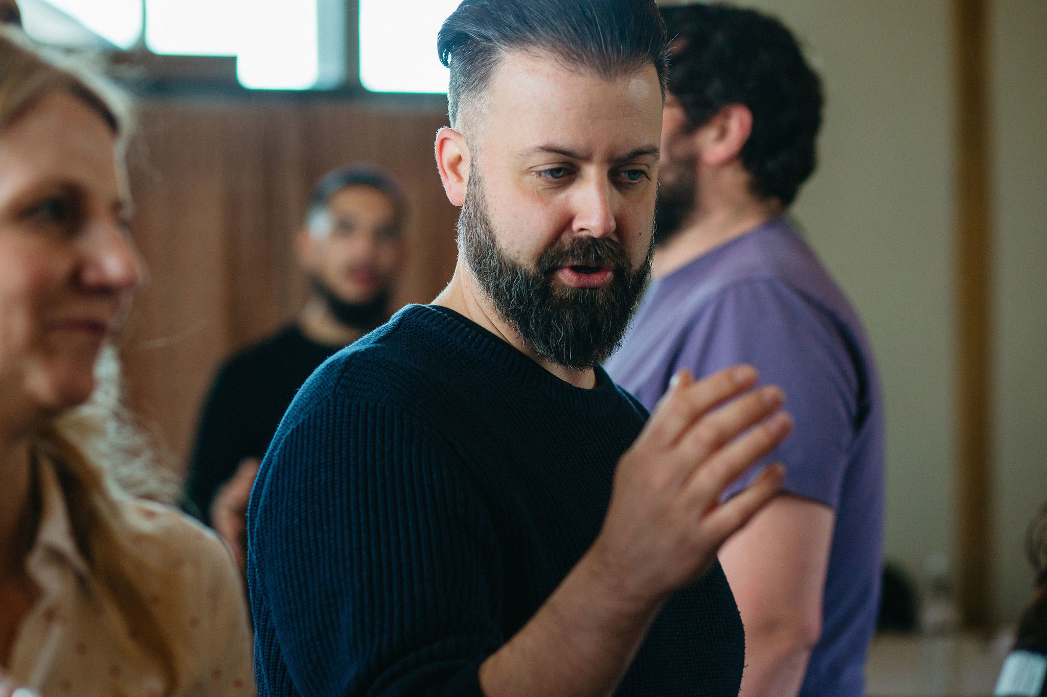 A person gesturing with their hand
