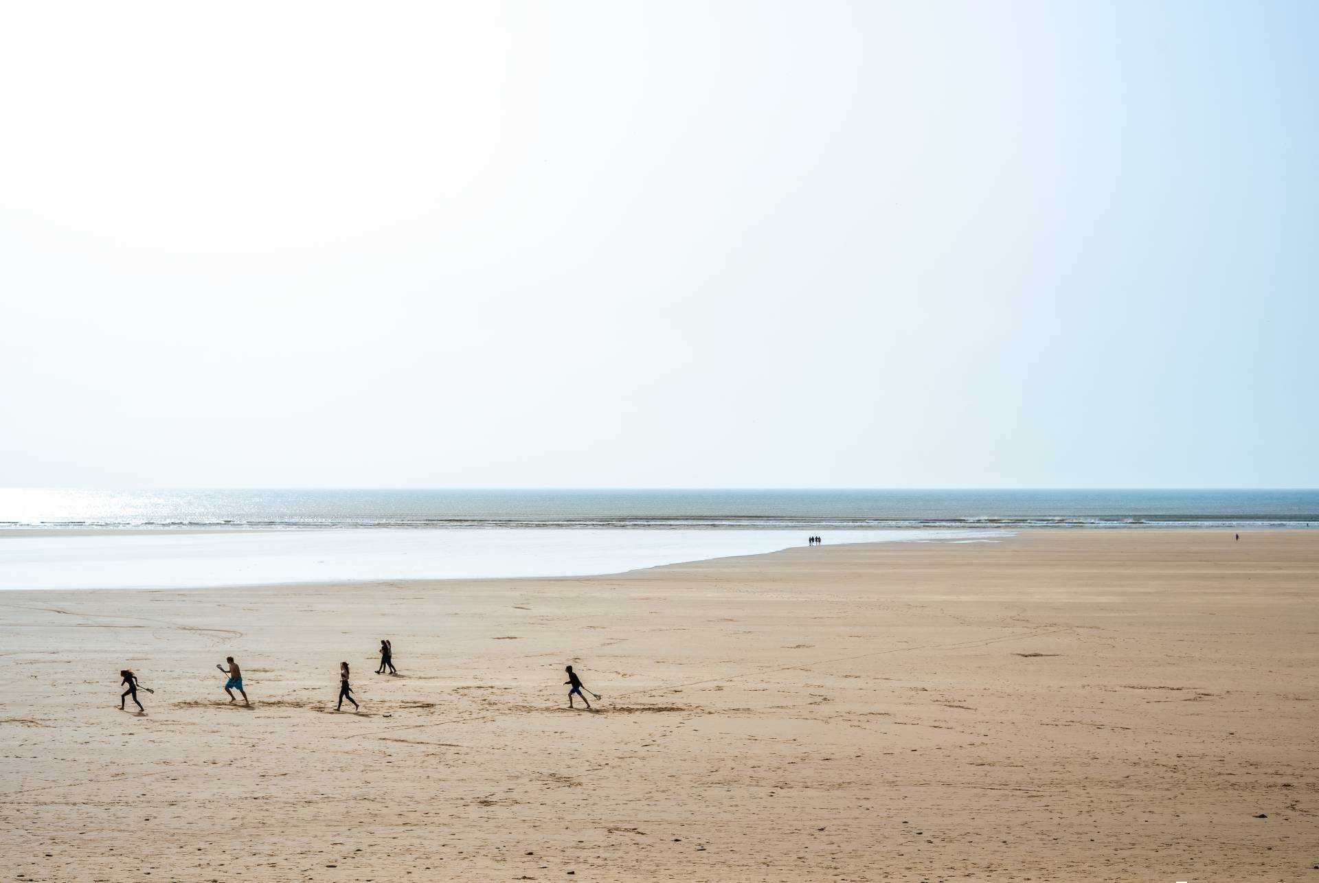 surfers on the beach