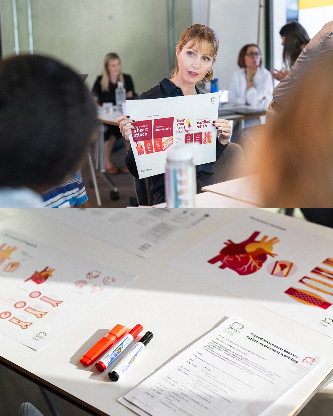A woman holds up a heart attack prevention leaflet during a group meeting, with printed health materials and pens laid out on the table in front of her.