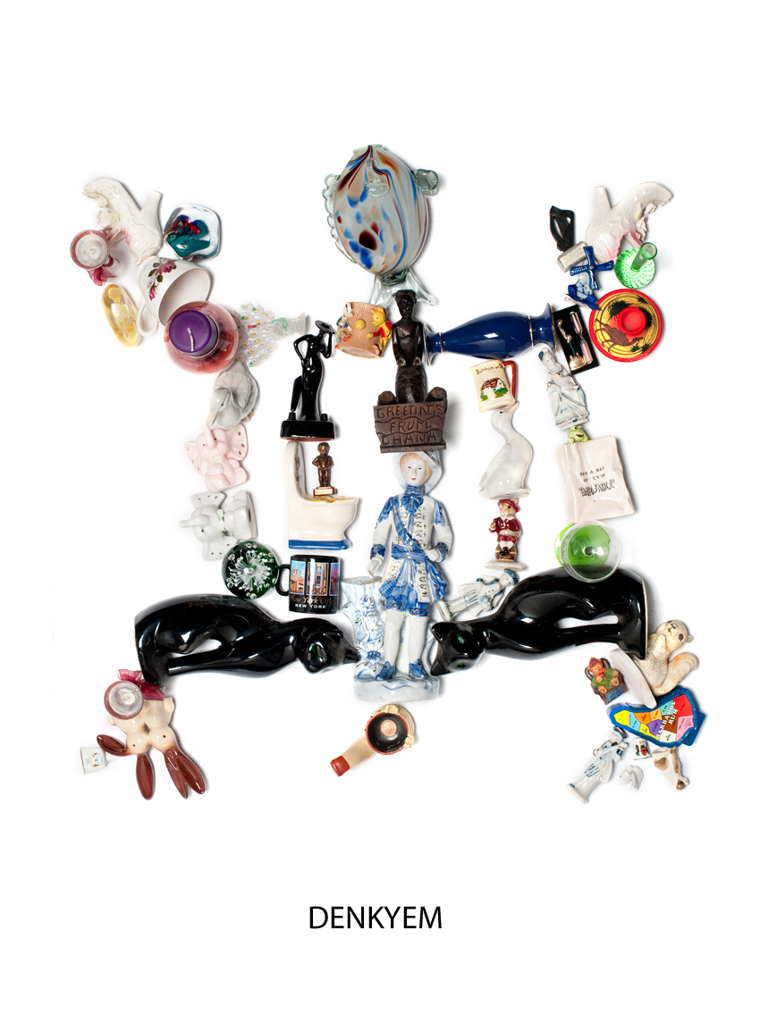 A series of toys, objects and ornaments arranged into a sculpture.