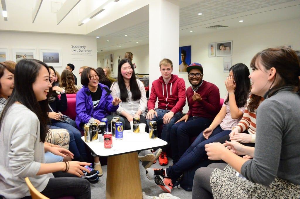 Students gathered around a circle