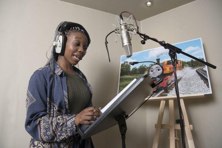 Yvonne voicing Nia in the studio