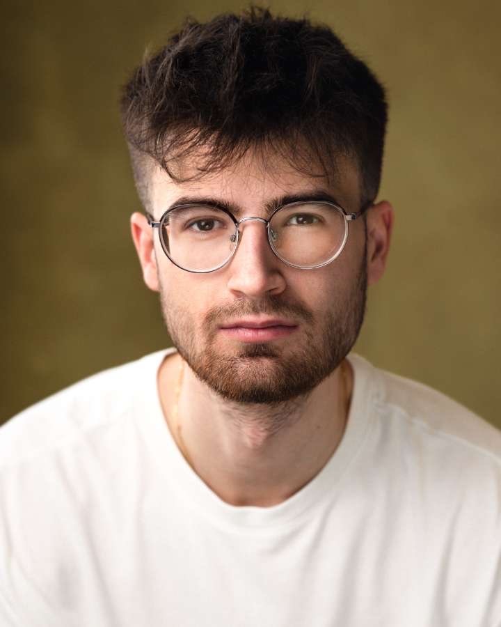 Headshot for D. Hancock.