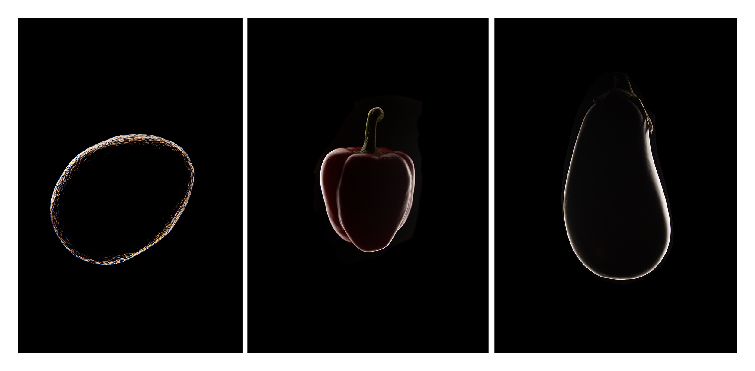 Silhouette of vegetables; a pepper, potato and aubergine