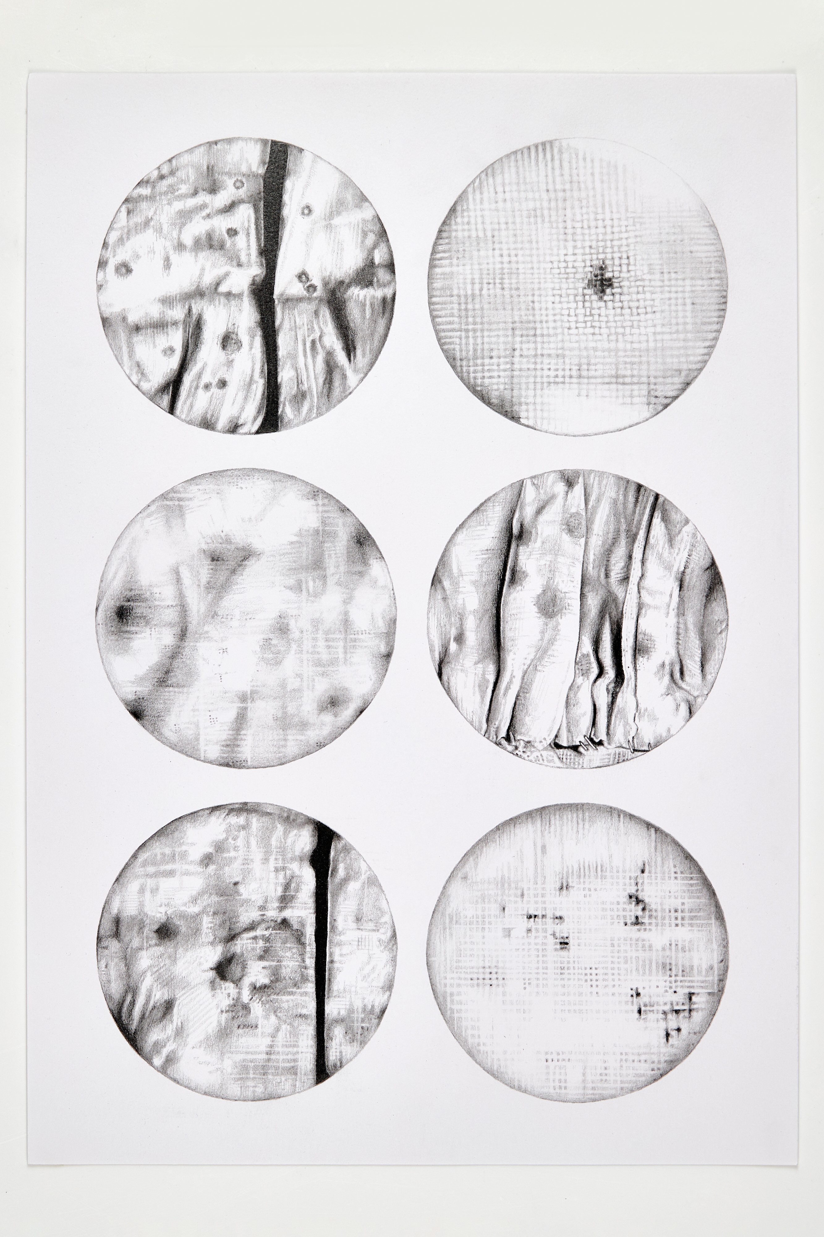 Abstract pencil-drawn work, six circles with varying textures on a white background.