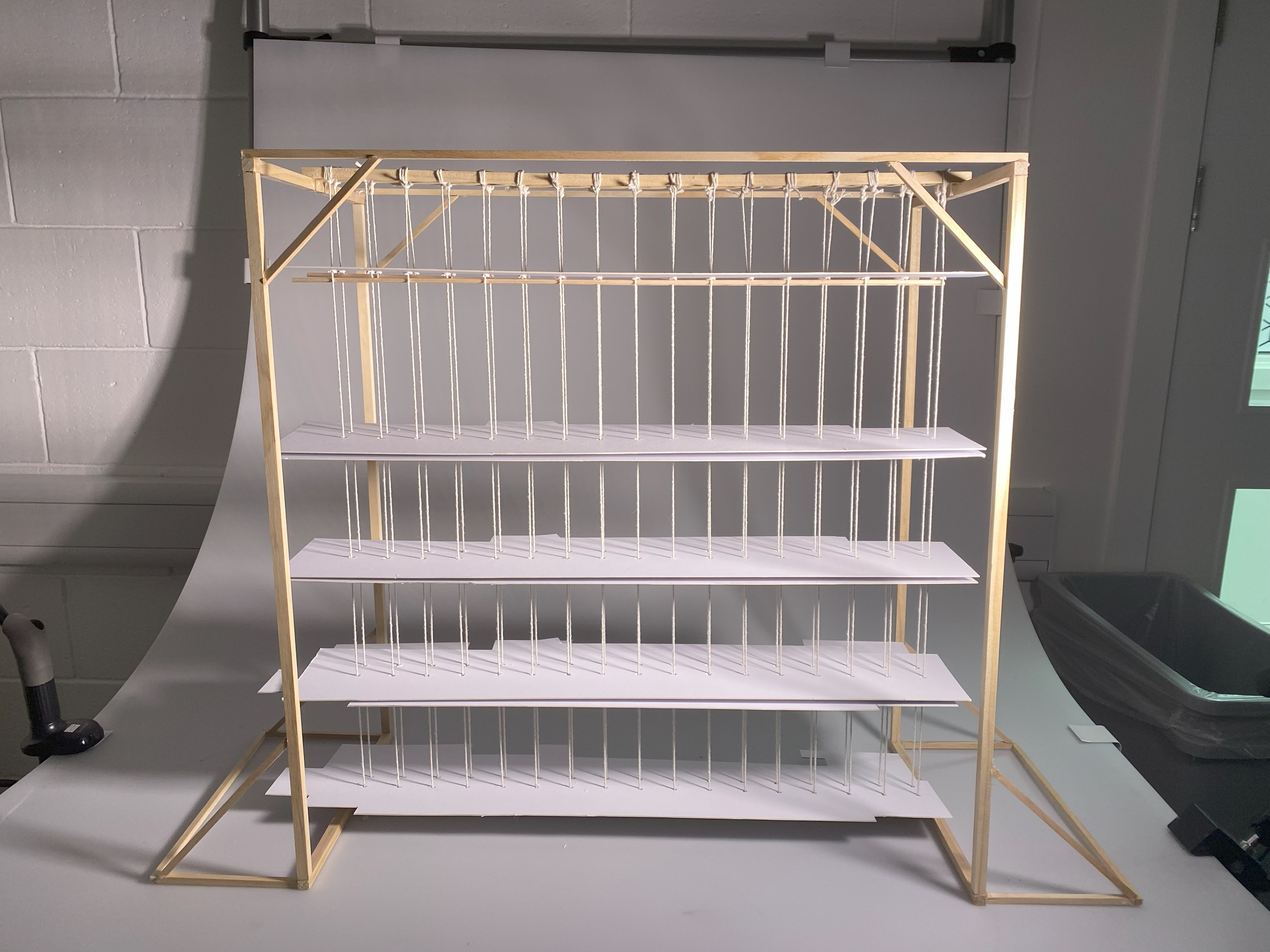 Exploratory practice - Level 5 Interactive structural model made with Oliver Dewes, wooden frame with strings and layers.