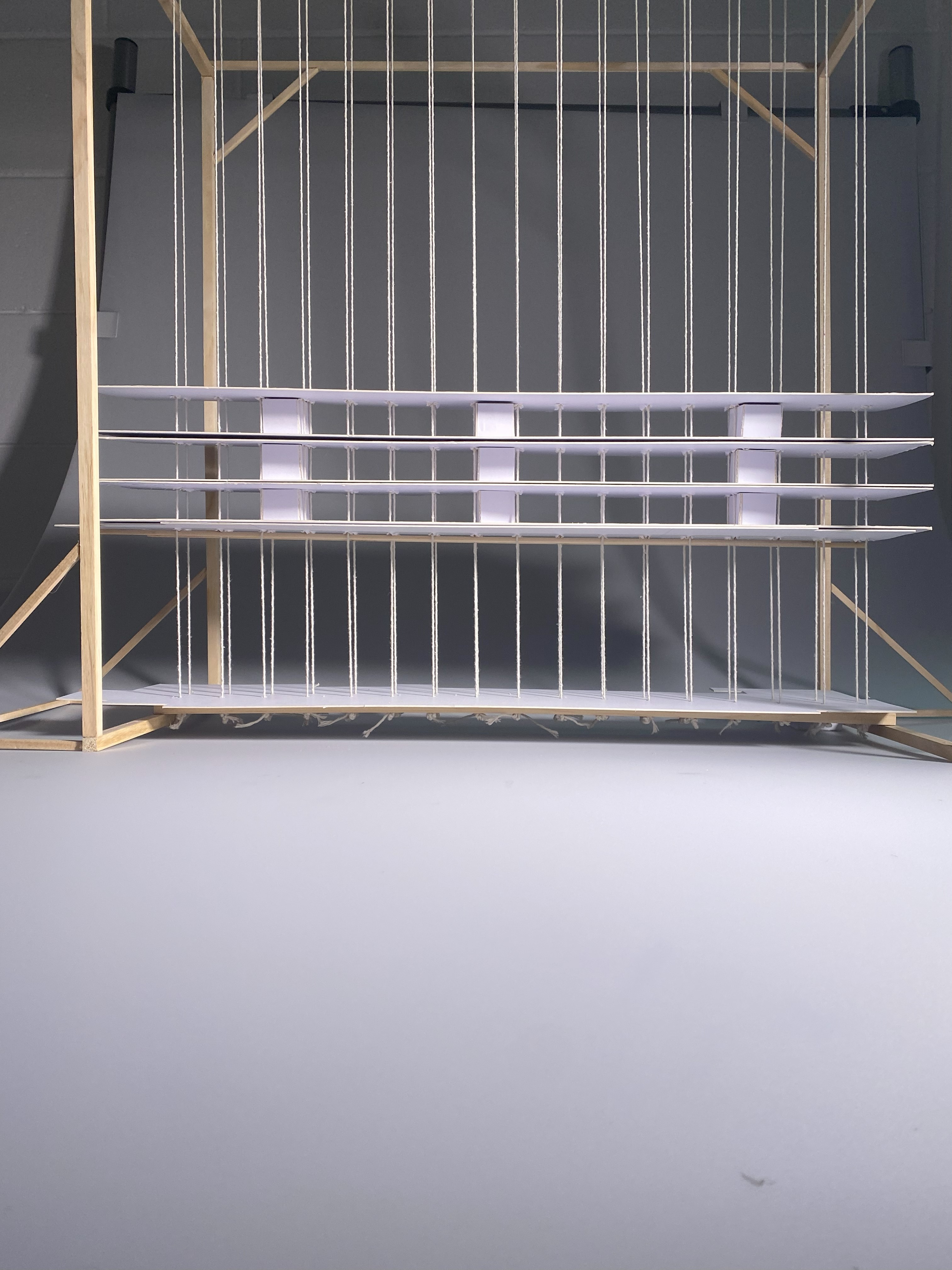Exploratory practice - Level 5 Interactive structural model made with Oliver Dewes, wooden frame with strings and layers.