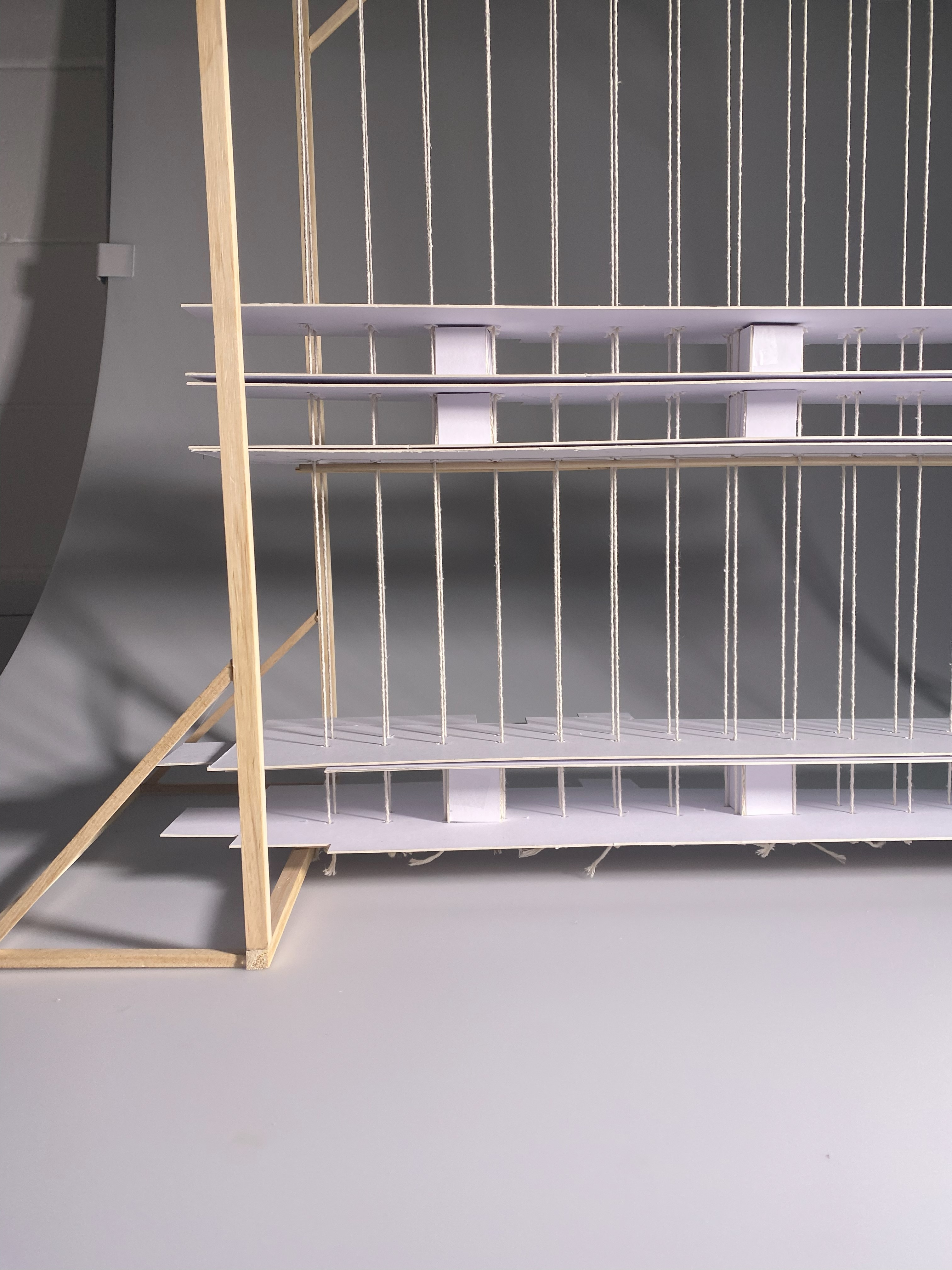 Exploratory practice - Level 5 Interactive structural model made with Oliver Dewes, wooden frame with strings and layers.