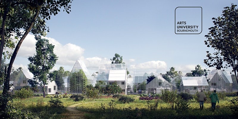A row of glass buildings with fields and trees surrounding.