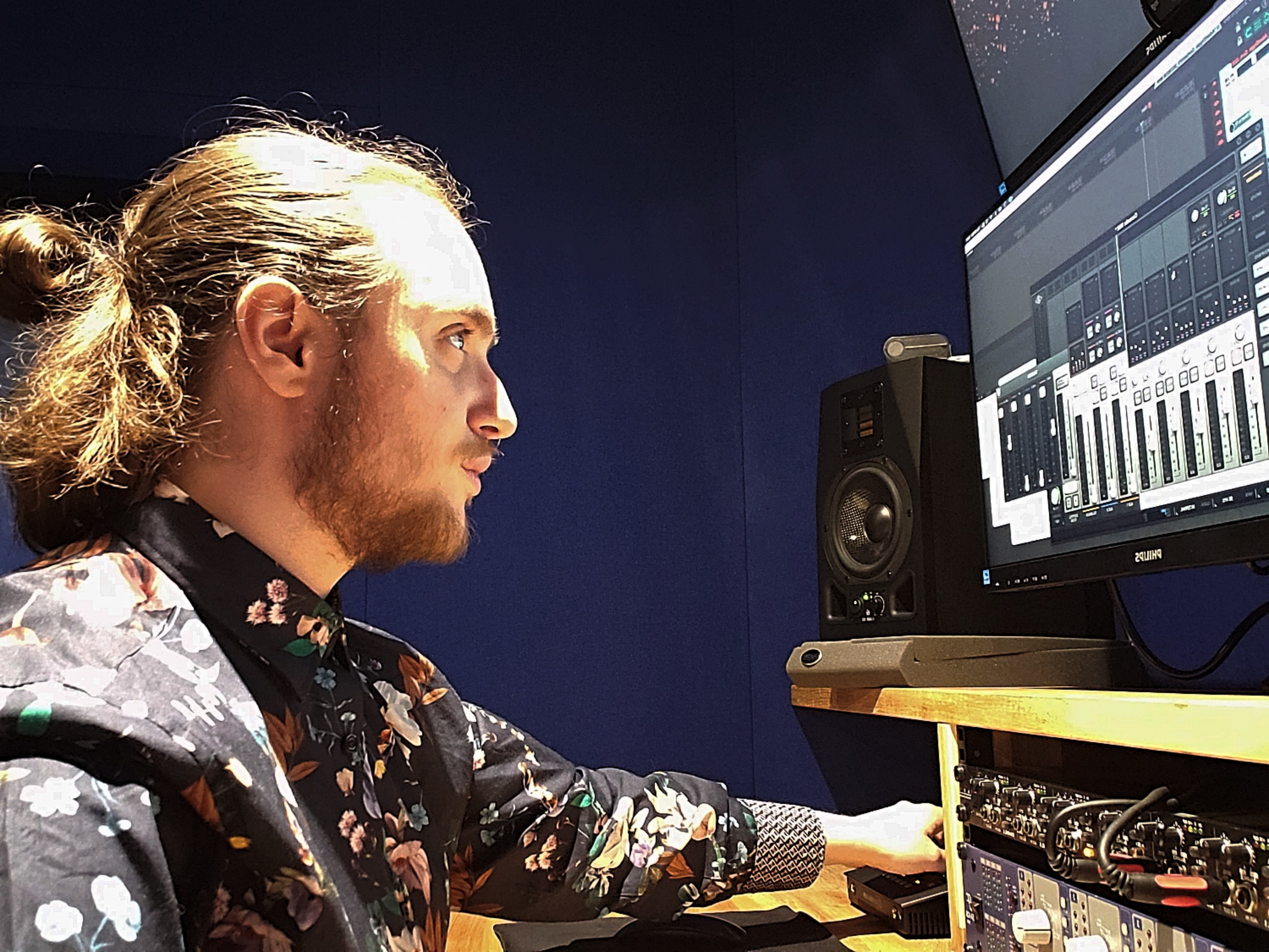 Elijah Vincent working with sound design equipment.