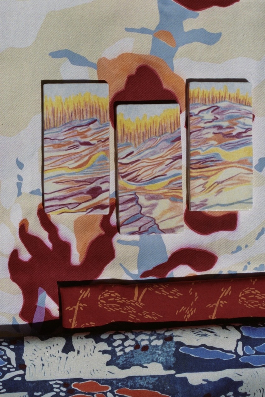 Close-up of UV printed tiles on top of screen-printed fabrics.