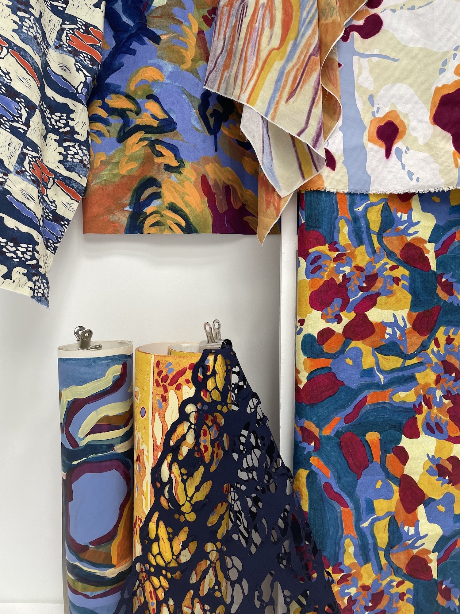 Several samples from Iberian Impressions – fabrics with abstract patterns on display