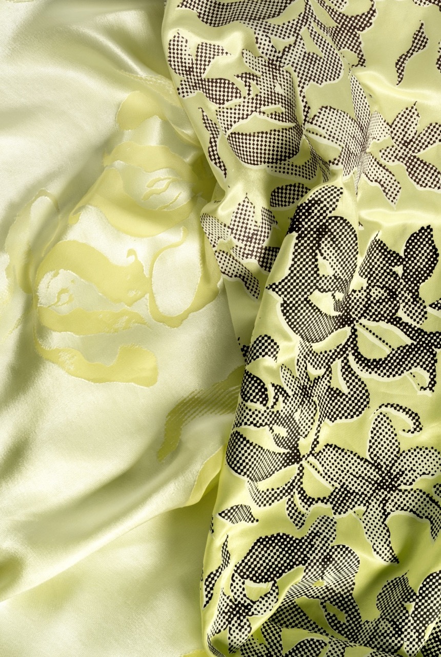 Pale green cabbage leaves on left, black halftone dot pattern overlaying similar leaf shapes on yellow-green background on right.