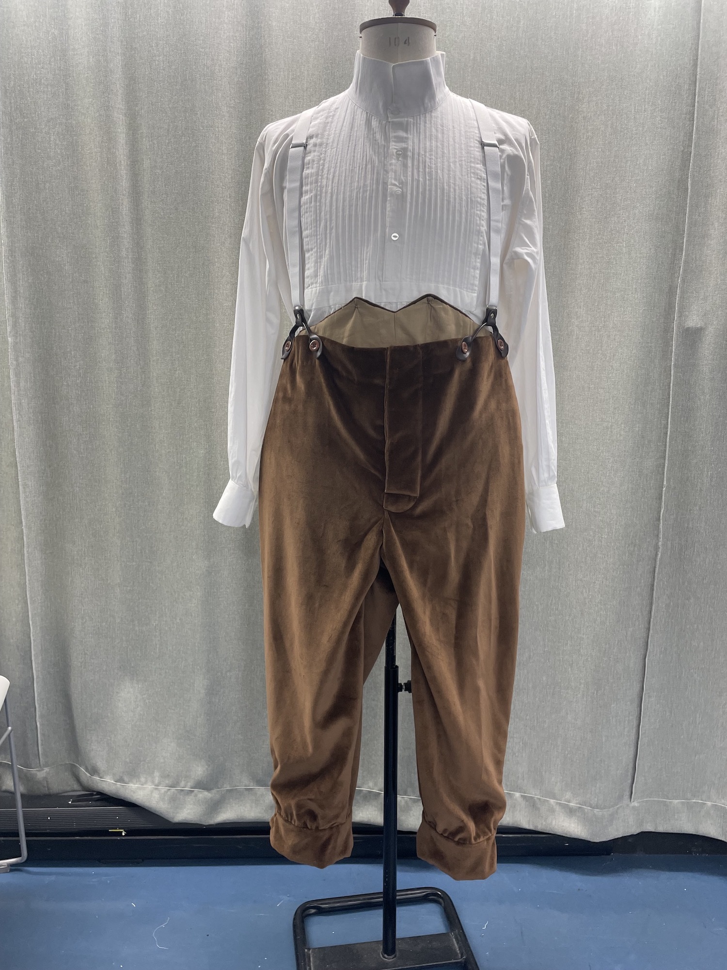 Undergarments for Captain Hook costume, with a white shirt and brown pantaloons on a mannequin.