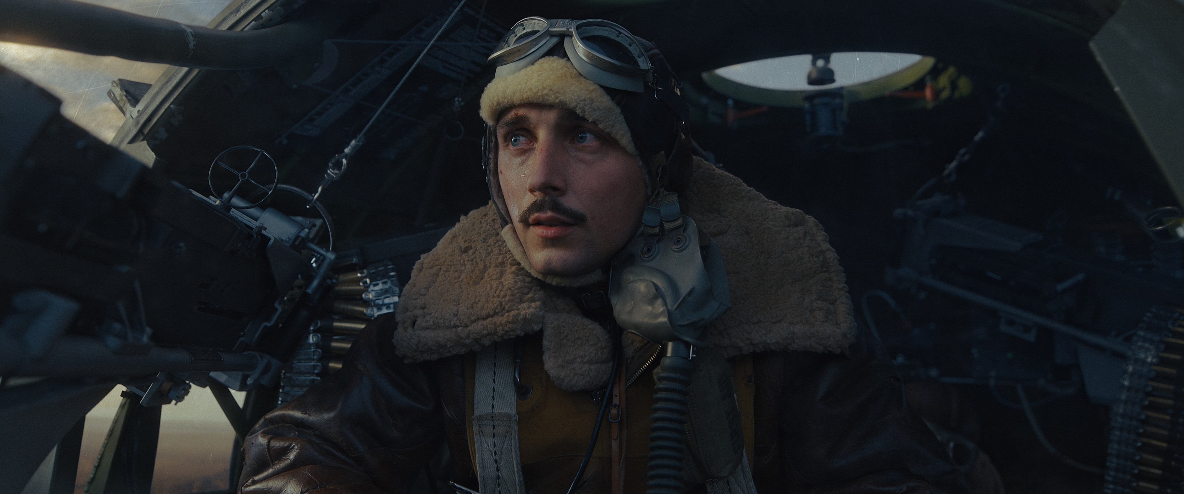 Still of Elliot Warren in character as Lt James Douglass in the war drama series "Masters of the Air".