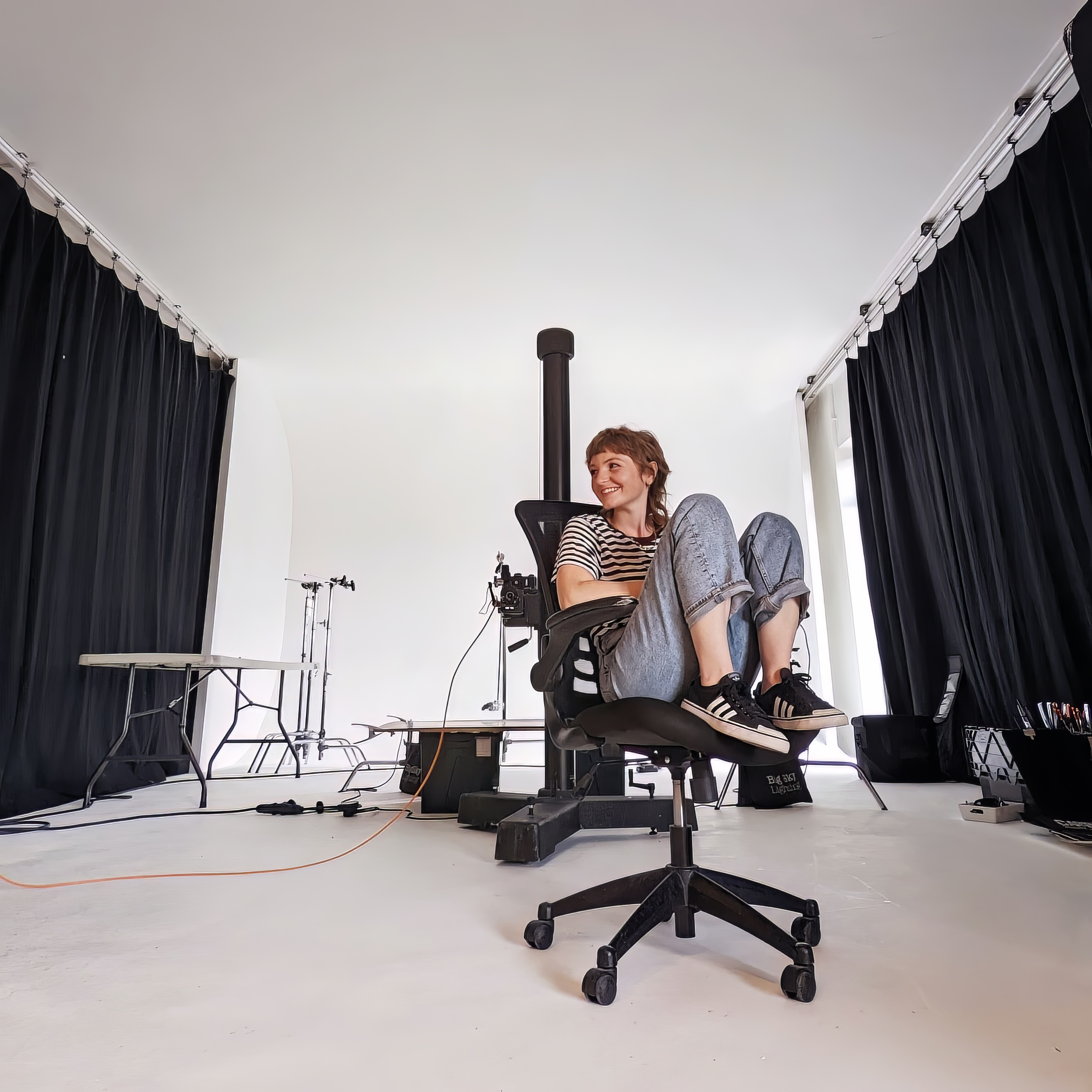 Photographer Frankie Turner sitting in her studio.