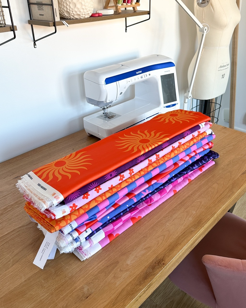 Colourful fabrics sewn by Tammy Johal with floral, sunny patterns.