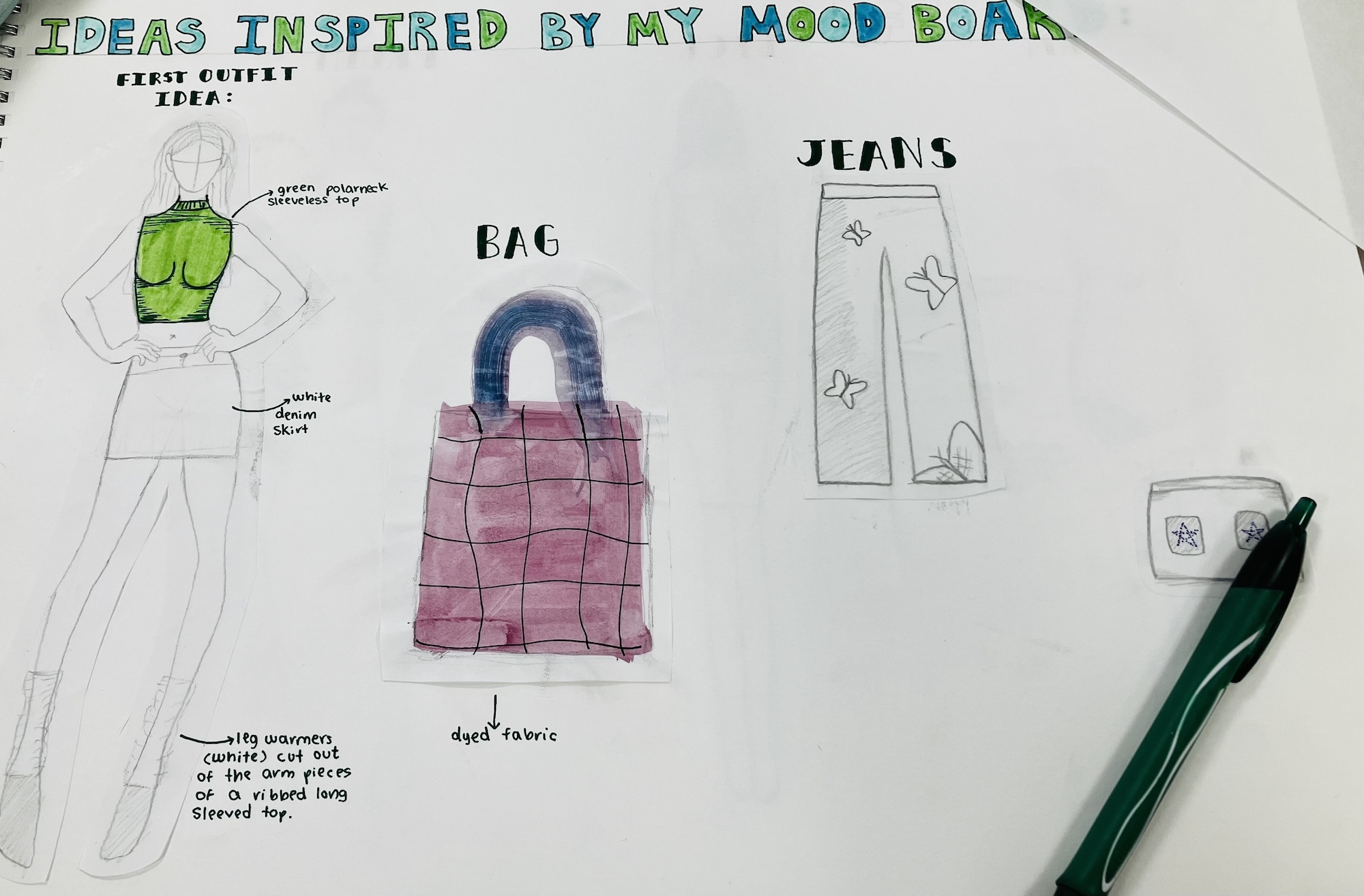 Hand-drawn fashion design sketches on white paper showing green crop top, pink checkered tote bag, and grey jeans with labels and notes