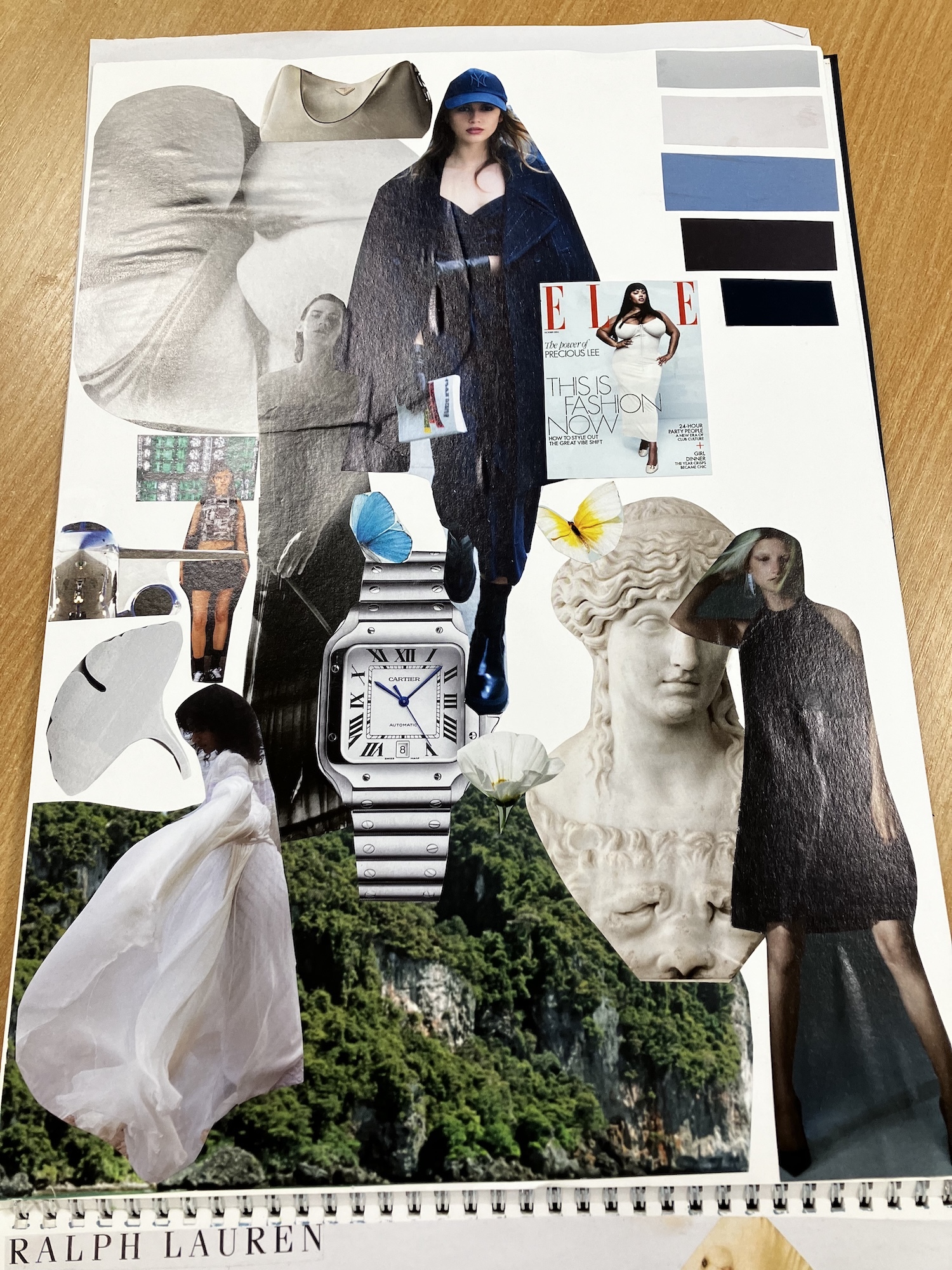 Fashion mood board collage with magazine cutouts, classical sculpture busts, silver watch, colour swatches in blues and greys, models in dark clothing, white dress, and green foliage on white background